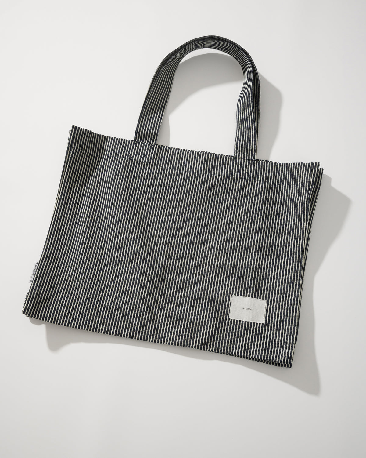 NOT WORKING NW702 HORIZONTAL TOTE BAG 黑白間條色 背面斜角
