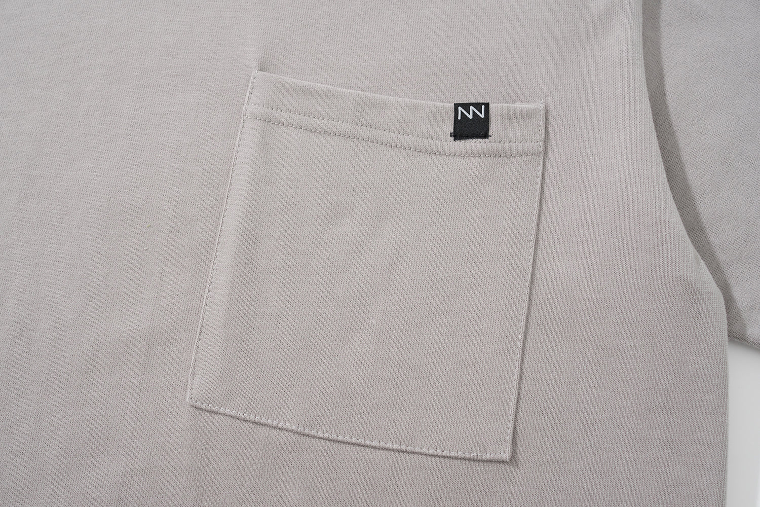 NOT WORKING III / OVERSIZED POCKET TEE