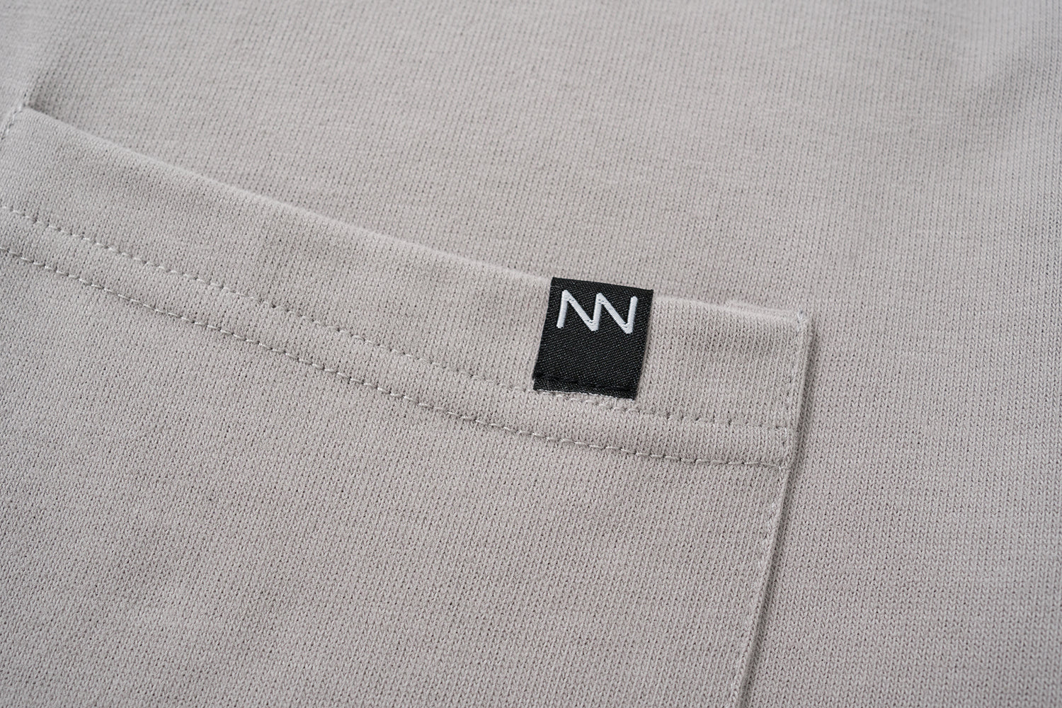 NOT WORKING III / OVERSIZED POCKET TEE