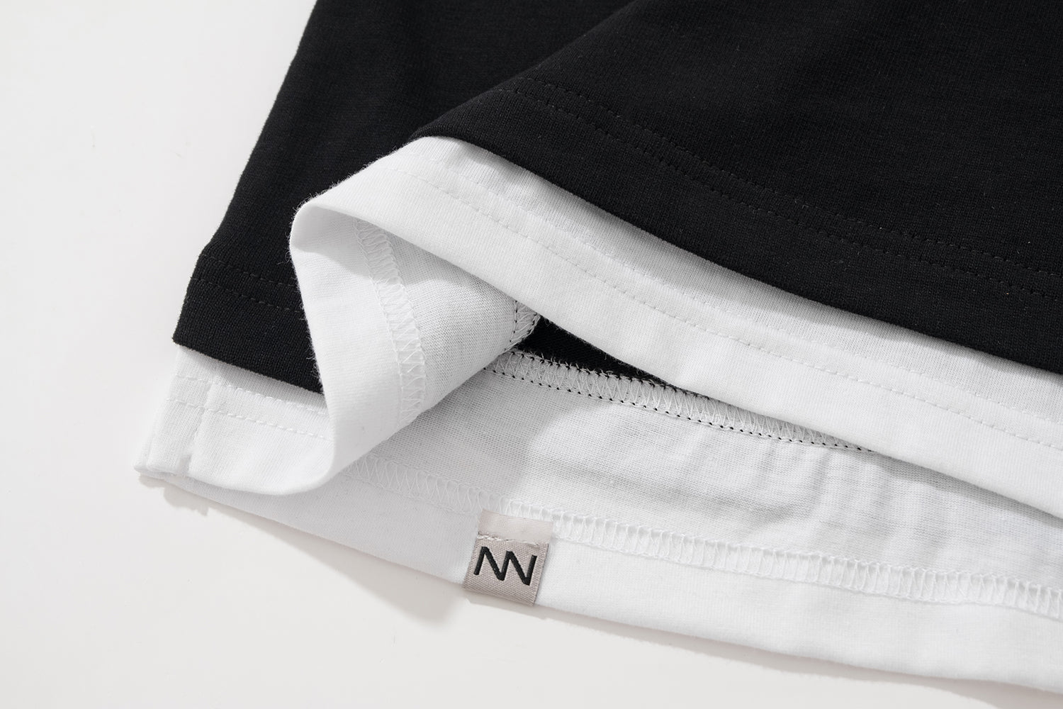 NW215BK | LAYER TEE | NOT WORKING V