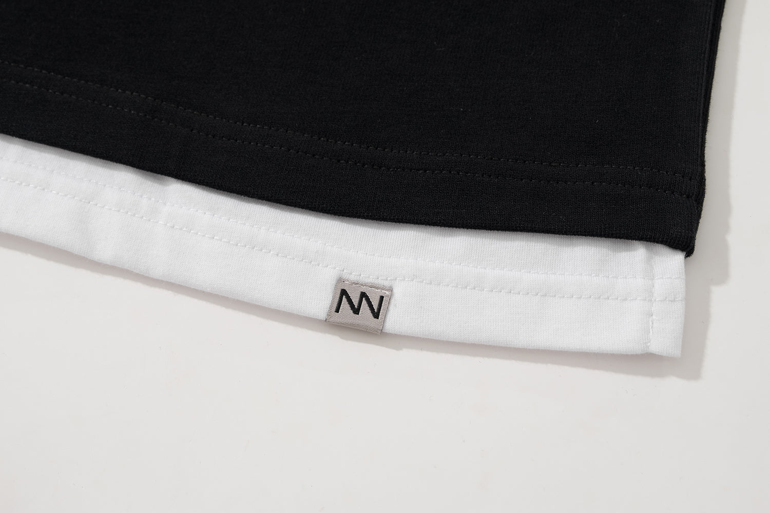 NW215BK | LAYER TEE | NOT WORKING V