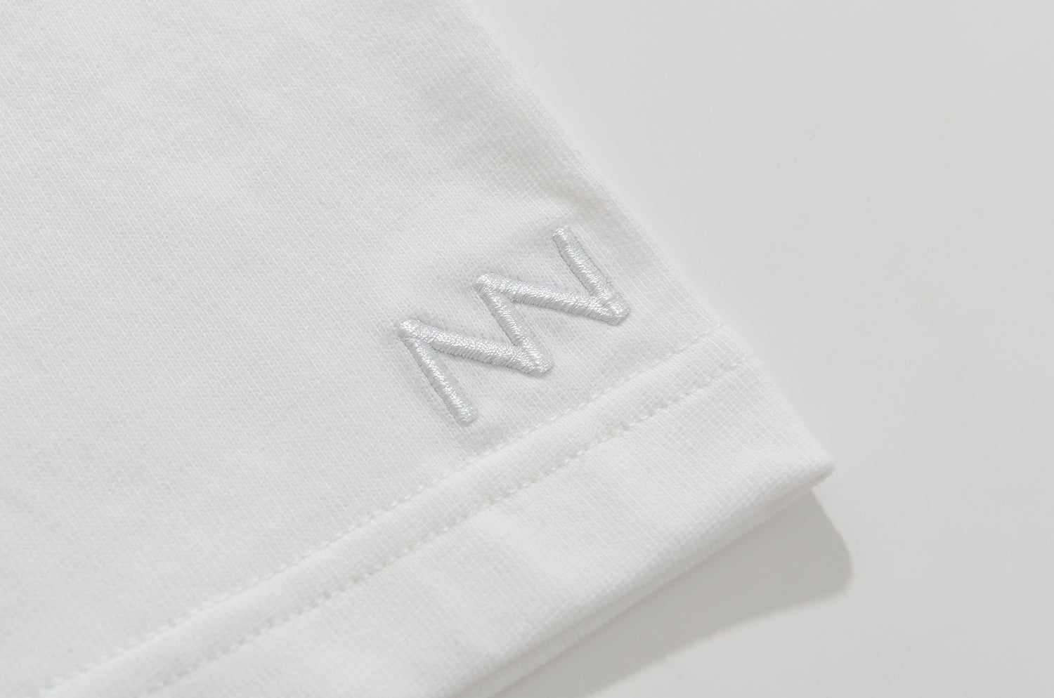 NW218WH | GREY LABEL TEE | NOT WORKING V