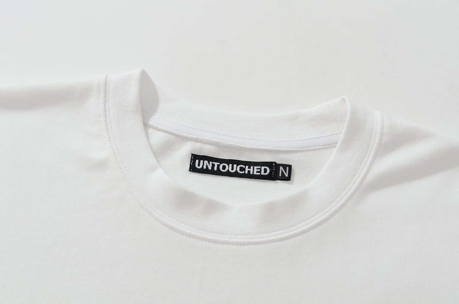 NOT WORKING V / OVERSIZED SQUARE POCKET TEE