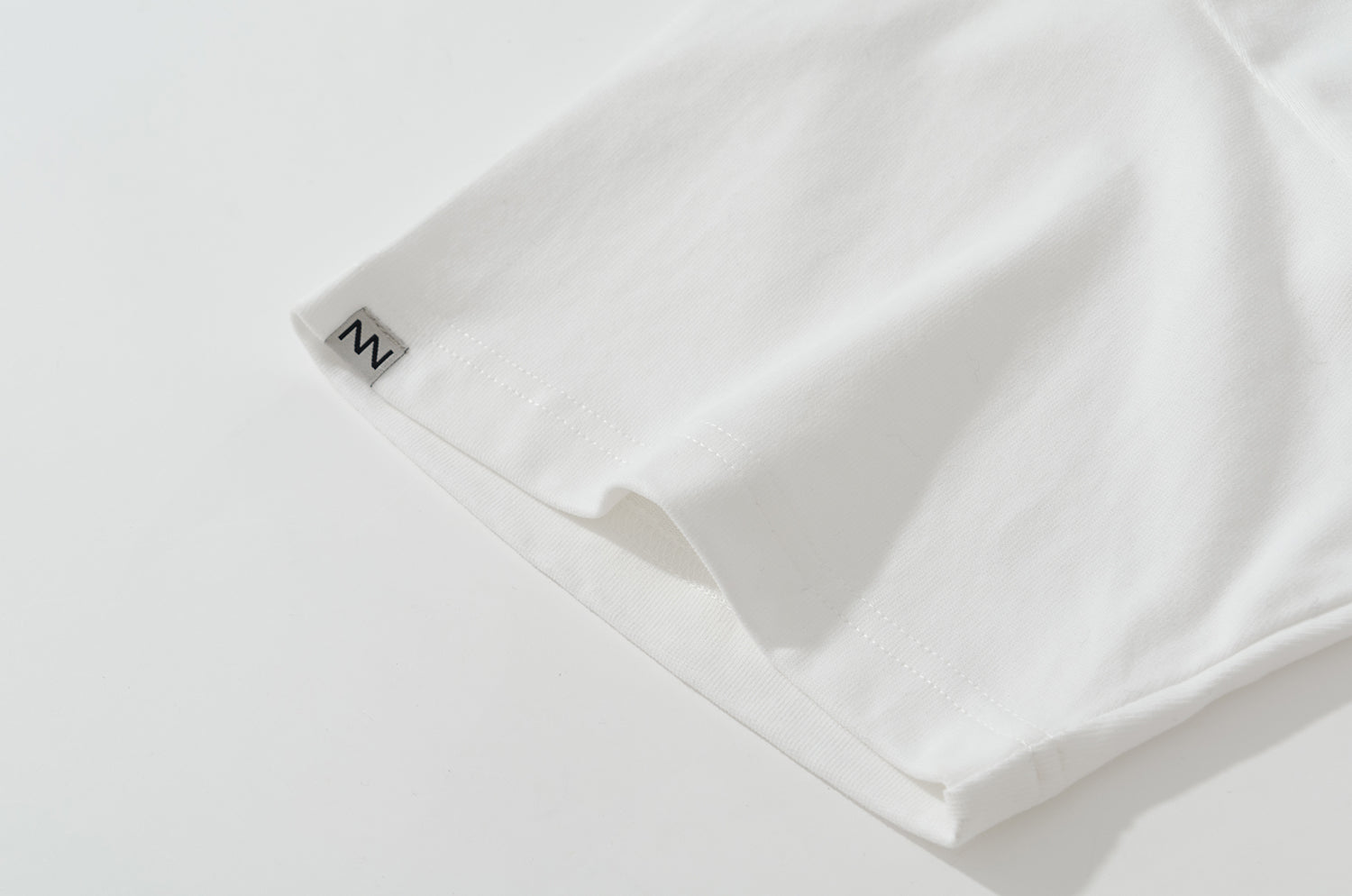 NOT WORKING V / OVERSIZED SQUARE POCKET TEE