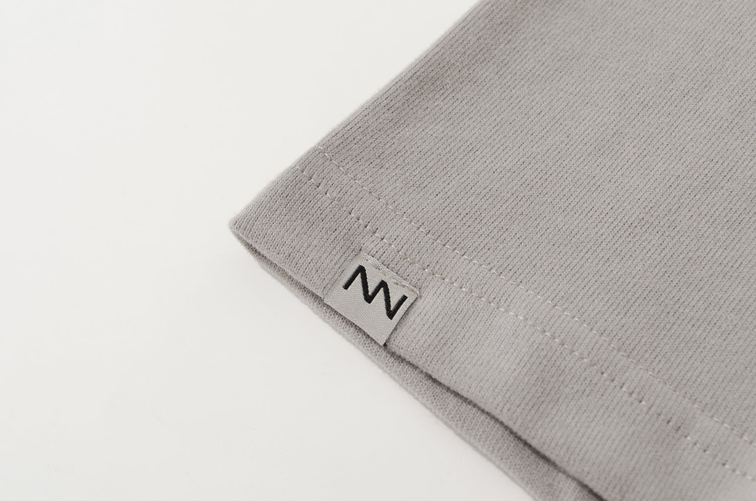 NOT WORKING V / OVERSIZED SQUARE POCKET TEE