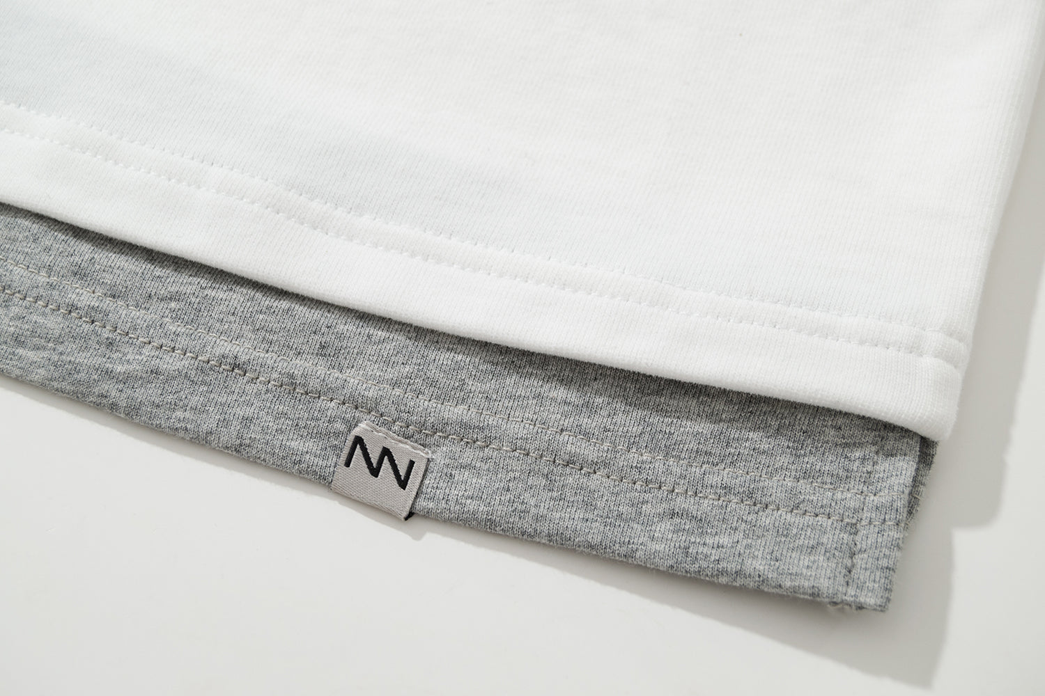 NW215WH | LAYER TEE | NOT WORKING V